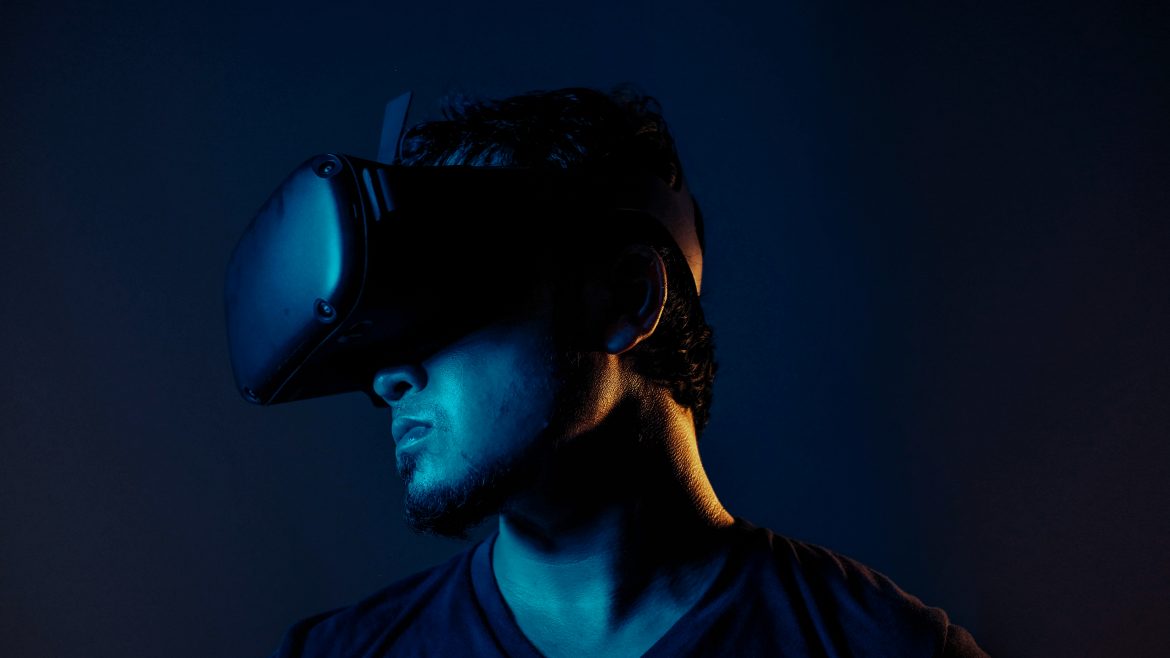 A man wearing Interactive Visuals and Wearable Technology looking to the left