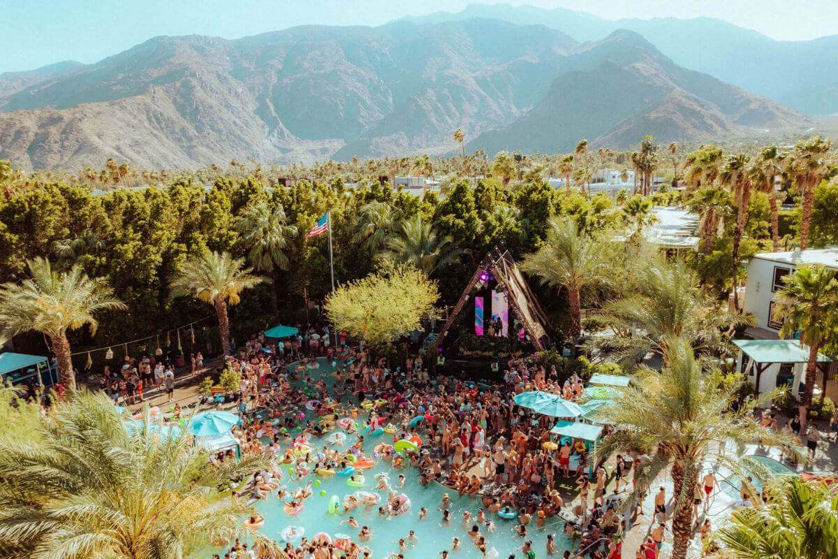 pool party surrounded by trees in an elevated view