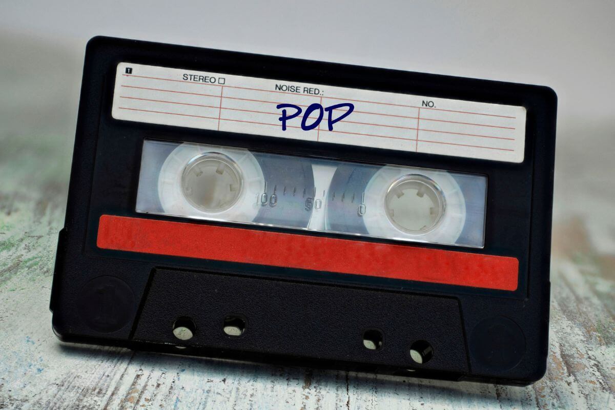 a cassette tape with the word POP written on its label 