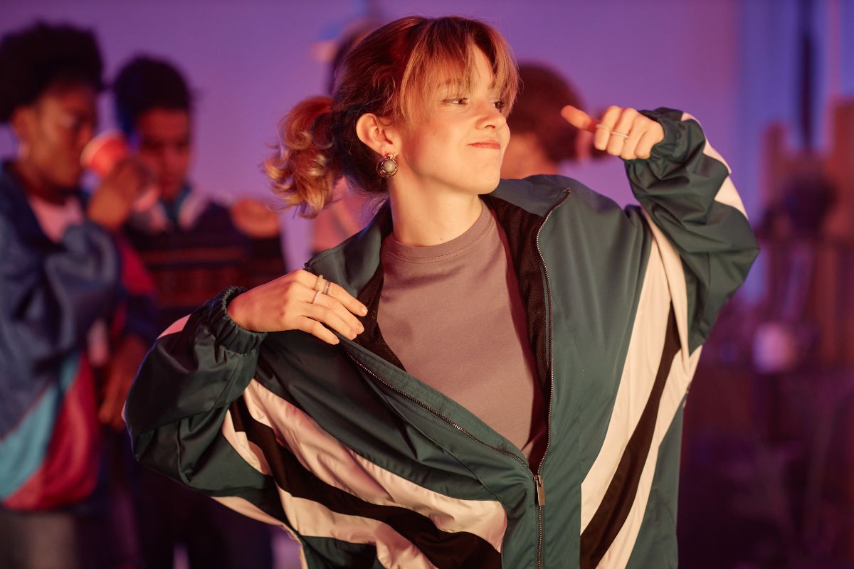 girl dancing in the club wearing 90s Vibe Fashion